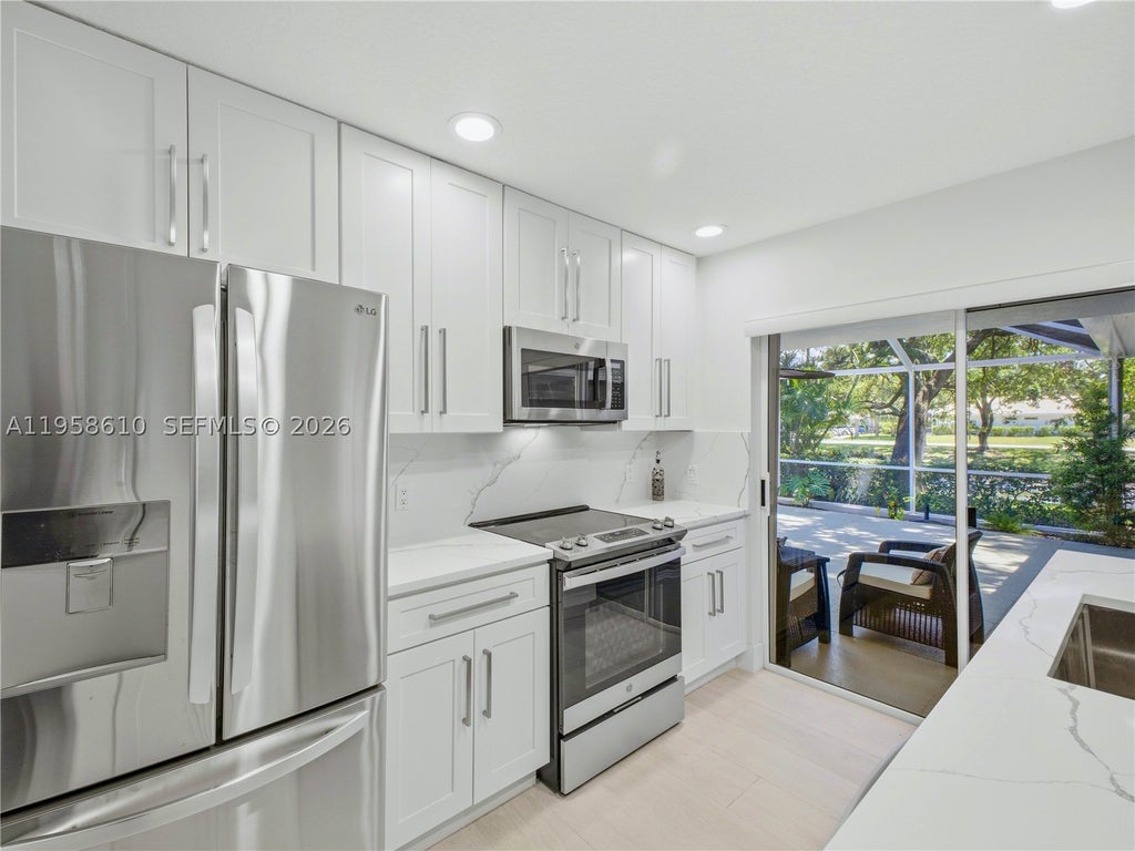Photo of 803 Silverleaf Oak Ct, Palm Beach Gardens, FL 33410 (MLS # A11958610)