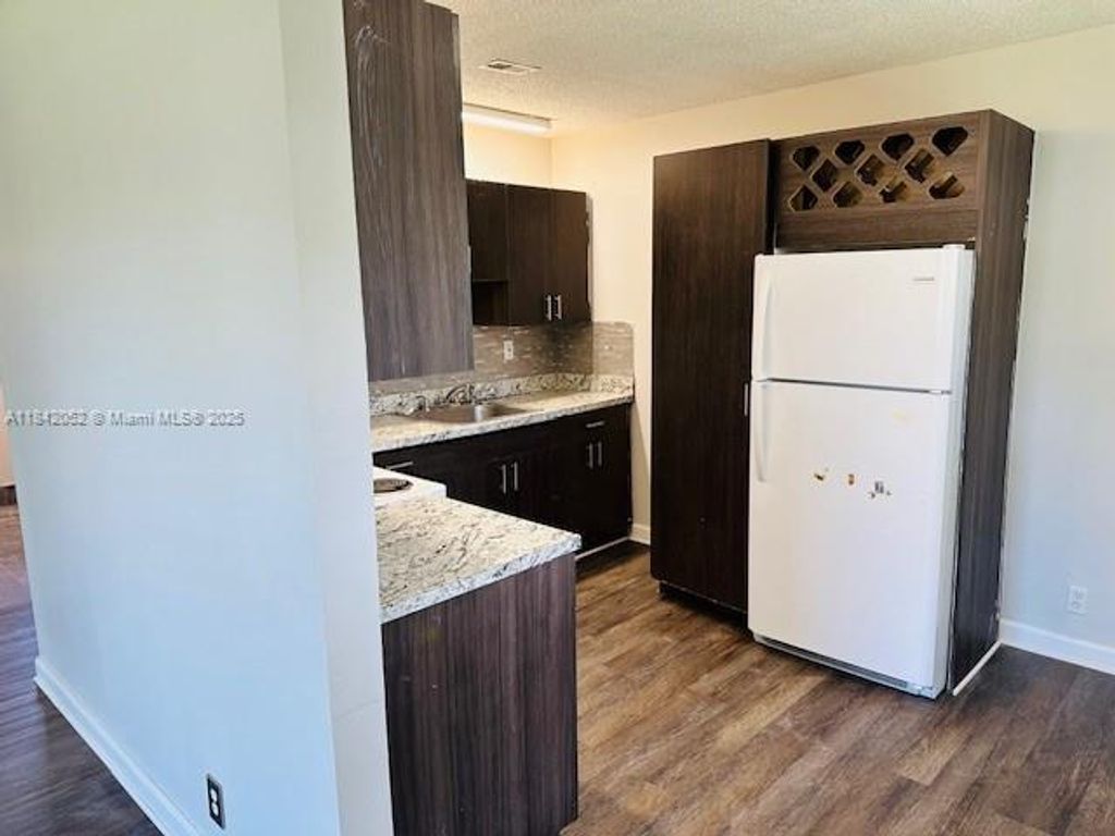 Photo of 853 SW 9th St #1, Hallandale Beach, FL 33009 (MLS # A11842052)