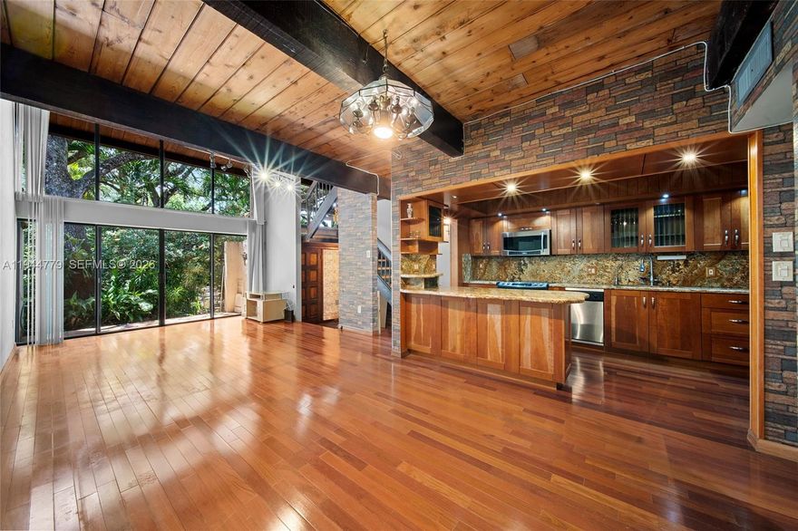 Step into a truly one-of-a-kind residence, thoughtfully designed with exceptional attention to detail and quality. This home offers a rare opportunity to own a space that feels refined, elevated, and carefully curated throughout.

As the largest layout in the community, the unit features a spacious and airy open floor plan that blends elegance with everyday comfort. The open-concept kitchen flows seamlessly into the living and dining areas, making it ideal for both entertaining and daily living. Floor-to-ceiling windows flood the home with natural light and provide beautiful, open views of the community, creating a bright and inviting atmosphere.

Every detail reflects high-end craftsmanship and premium upgrades, including expensive cherry oak wood cabinetry and flooring, along with extensive use of luxurious granite surfaces that add timeless sophistication and warmth.

Major improvements have already been completed, including a brand-new roof with the assessment fully paid, offering peace of mind and added value.

Located in a prime, highly desirable area, this residence is just minutes from Aventura Mall, the Brightline station within 5 minutes, and less than 5 minutes from the beach. This exceptional home perfectly combines luxury, space, and convenience in one remarkable offering.