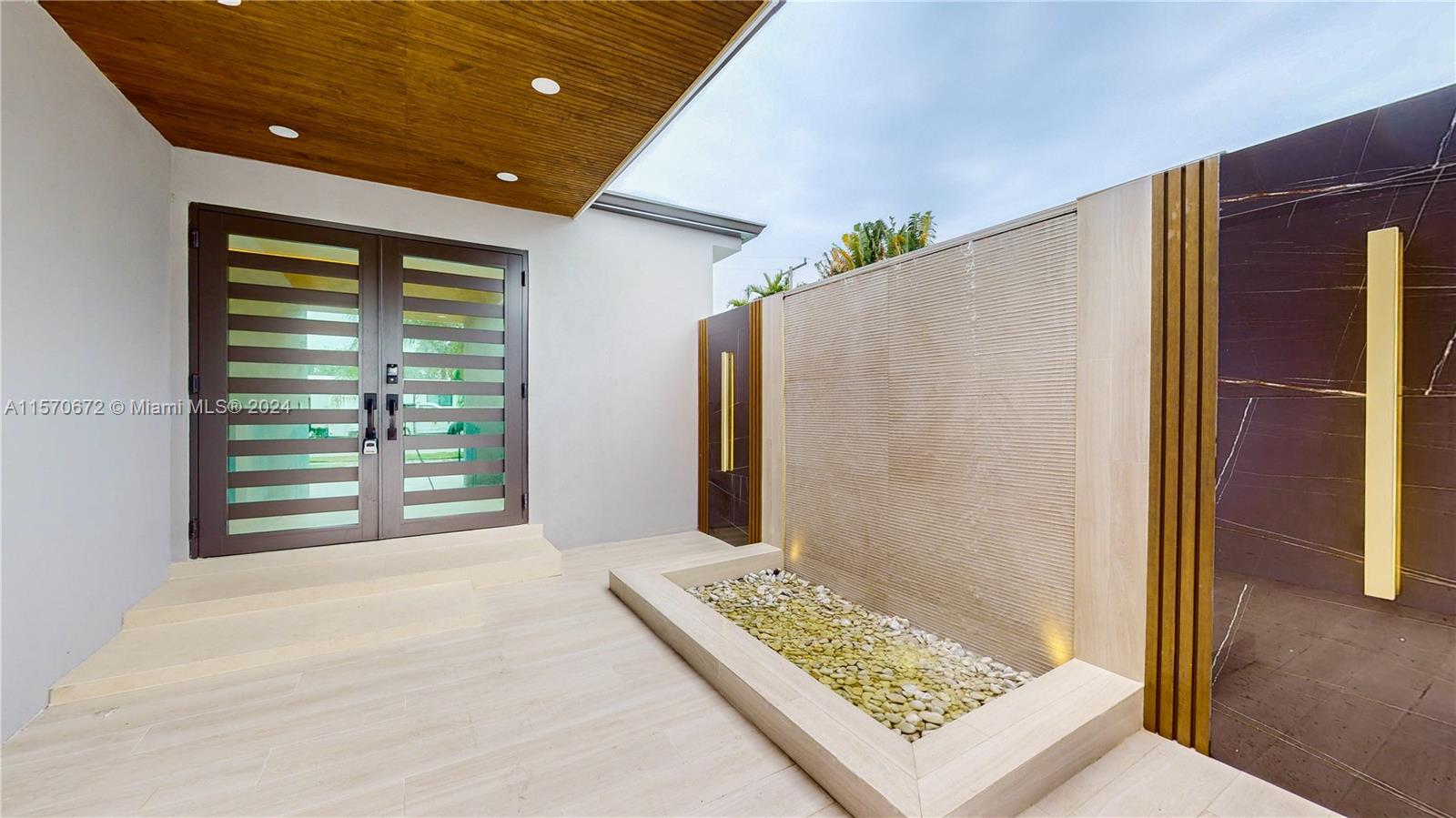 This beautifully renovated 5/4.5 is a fully furnished home that spares no expense. Key features include: New appliances and quartz countertops, Hurricane-resistant windows and doors, new roof, washer and dryer, Maid's quarters with a full bath providing additional living space or a potential guest room. A huge backyard, perfect for outdoor activities and relaxation. A BBQ area with a full kitchen, ideal for outdoor cooking and entertaining. A 40' pool with a bar, offering a luxurious and relaxing swimming experience. These features collectively make the home stand out as a top-tier rental property, providing comfort, safety, and luxury for potential renters. Just a complete beauty. Must see - Call Listing Agent for showings...
