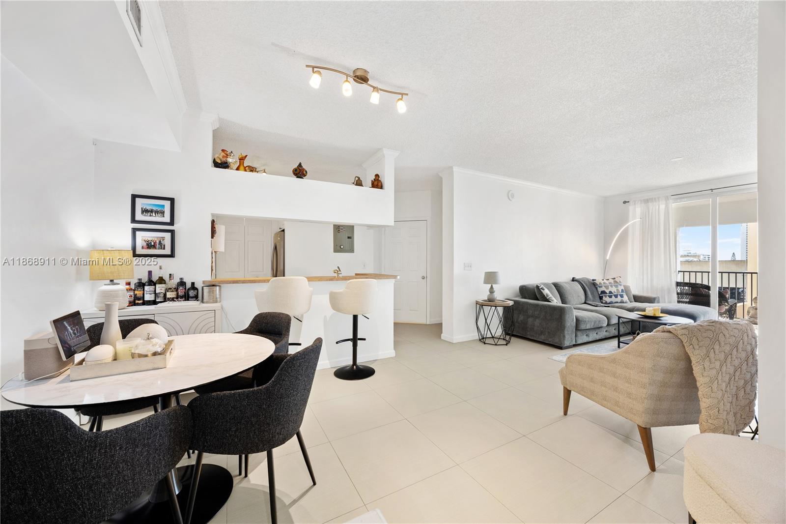 Spacious and bright 2 bed 2 bath penthouse in Porto Bellagio, full-service building with amazing amenities steps from the beach in Sunny Isles. This is a split floorplan with large balcony facing South in the main building with pristine heated pool, clubhouse, state of the art 24-hour gym, pool table, business center, BBQ area and a promenade on Intracoastal. The condo offers open floorplan, modern large time in living area, in-unit washer and dryer, A/C replaced 2022, all appliances replaced in 2024. Pet friendly. Excellent schools & walking distance to shops, restaurants, grocery stores & the beautiful beach. Assigned parking space. Perfect for investors, can be rented right away, every 4 months. Tenant till December 31, 2025.