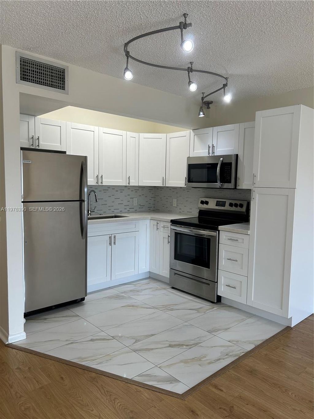 Photo of 1400 SW 124th Ter #405Q, Pembroke Pines, FL 33027 (MLS # A11978390)