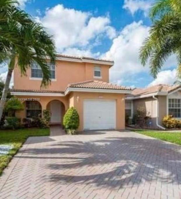 Photo of 9204 NW 54th St, Sunrise, FL 33351 (MLS # A12016327)