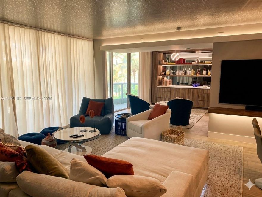 SPECTACULAR BEACHVIEW IN AZURE CONDO... This fabulously decorated 2 Bd/2 Bath was made into a large 1 bed/den open floorplan with chic Japanese wood sliding doors. This stunning layout offers a unique contemporary design offers a fresh point of view. Upon entry a lovely foyer awaits. Followed by the den then a sleek kitchen with Miele & Subzero appliances with stone counter-tops, bright living & dining area. The exquisite master suite is equipped with massage showers and a large spa tub which are state-of-the-art. Take in the sea breeze on the oversized balcony. At Azure Condo residents can enjoy world class amenities including spa, sauna, massage & treatment rooms, heated pool, fitness center & beach service! At walking distance from Surfside shops, Bal Harbour shops, restaurants & more!