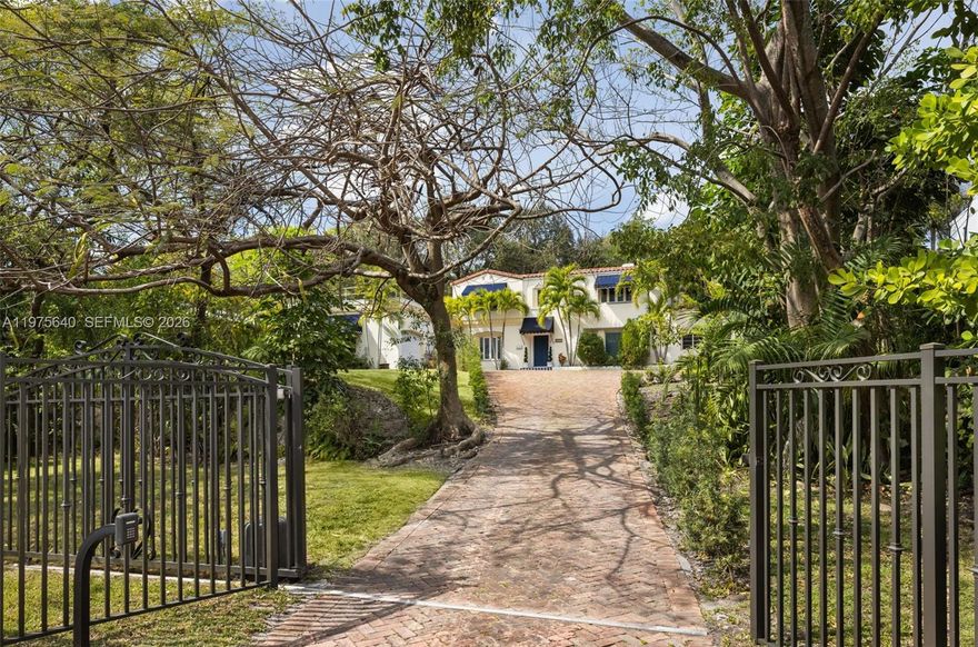 Positioned along the coveted South Bayshore hillside, this gated residence sits on an expansive 19,800 SF lot—offering a unique opportunity to renovate or create a new estate in one of Coconut Grove’s most prestigious residential corridors. Mature tropical landscaping frames the property, while the elevated setting provides privacy and a sense of retreat just moments from the energy of the Grove and Biscayne Bay. The existing home offers generous living spaces across two levels, with 2 bedrooms and 2.5 baths on the main floor and 3 bedrooms and 2 baths upstairs. Formal living and dining rooms define the interiors, highlighted by a fireplace-anchored living room and a spacious family room with French doors opening to the terrace. A pool, expansive yard, two-car garage, and rooftop access further enhance the property’s versatility and future potential.
Just steps from Biscayne Bay and minutes from Coconut Grove’s marinas, parks, and vibrant village center, this exceptional property offers the scale, location, and elevation to reimagine a signature residence along iconic South Bayshore Drive.