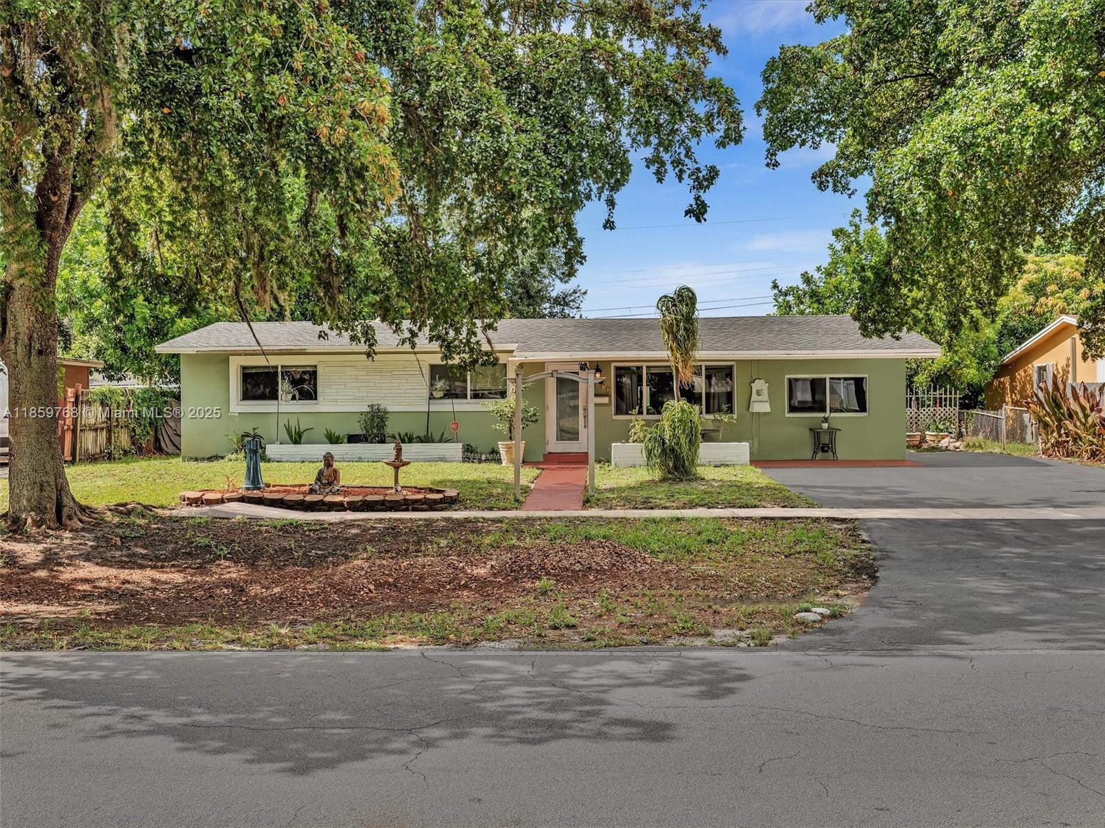 Charming single-family home in prime Hollywood location near shopping, dining, parks & major highways. No HOA! Features an extra bedroom & bathroom that can serve as a master suite or be rented as an efficiency with its own entrance, plus an additional side efficiency—offering the opportunity for two rental incomes while living in the main house. Enjoy a huge backyard with shed, covered patio, and hurricane impact windows throughout. Perfect for homeowners or investors seeking versatile living space.