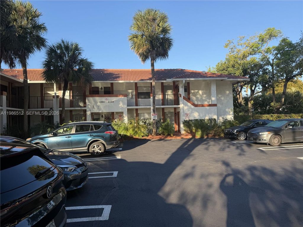 Photo of 2388 Coral Springs Dr #2388, Coral Springs, FL 33065 (MLS # A11986512)