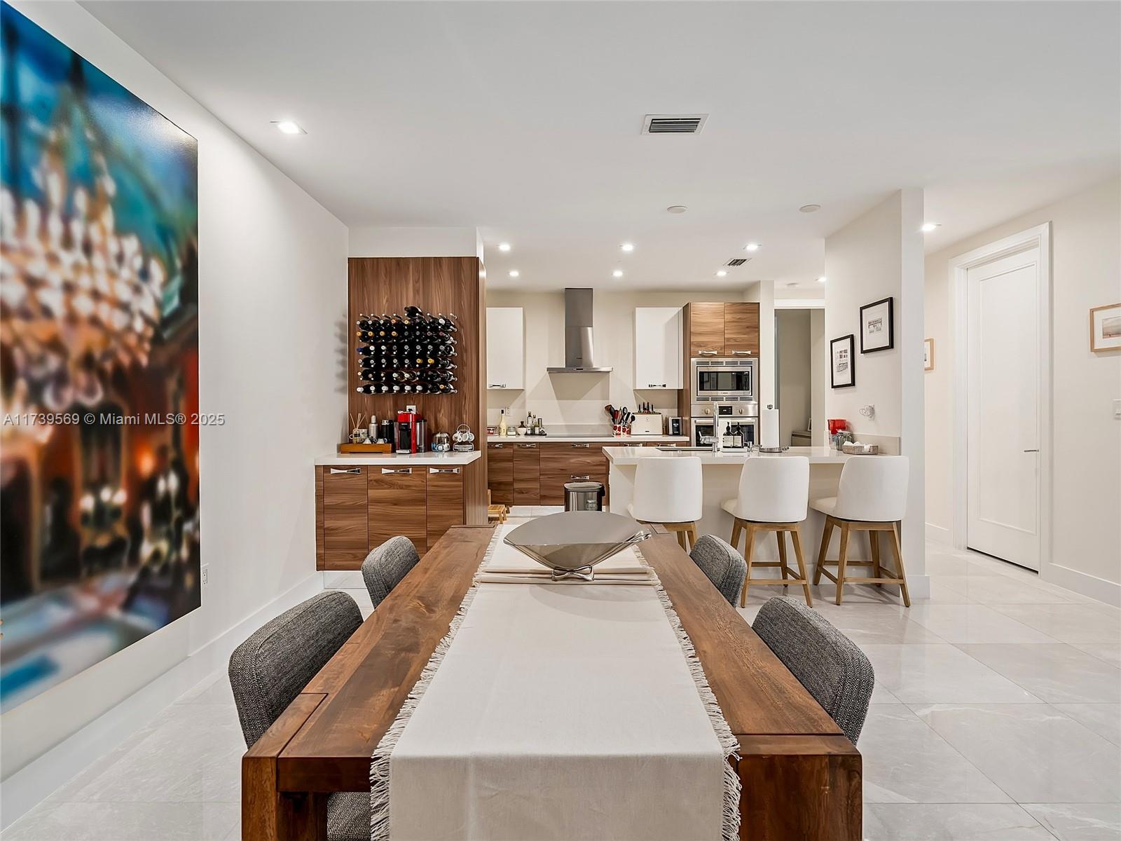 Elevate your lifestyle at Biltmore Parc, Coral Gables' premier boutique building. This 2-bedroom, 2.5-bath + den residence features luxury finishes, marble flooring throughout, a private elevator, and an open, light-filled floor plan. The European kitchen is equipped with premium Bosch stainless-steel appliances, and the walk-in laundry room with sink adds convenience and style. NanaWall glass doors open to a spacious terrace with sweeping views and a built-in screen enclosure for added comfort.
Built in 2017, this 32-unit building offers 24-hour concierge, key fob entry, and two reserved parking spaces. Walk to top dining, shopping, parks, and golf courses.
The ultimate in luxury living in Coral Gables.