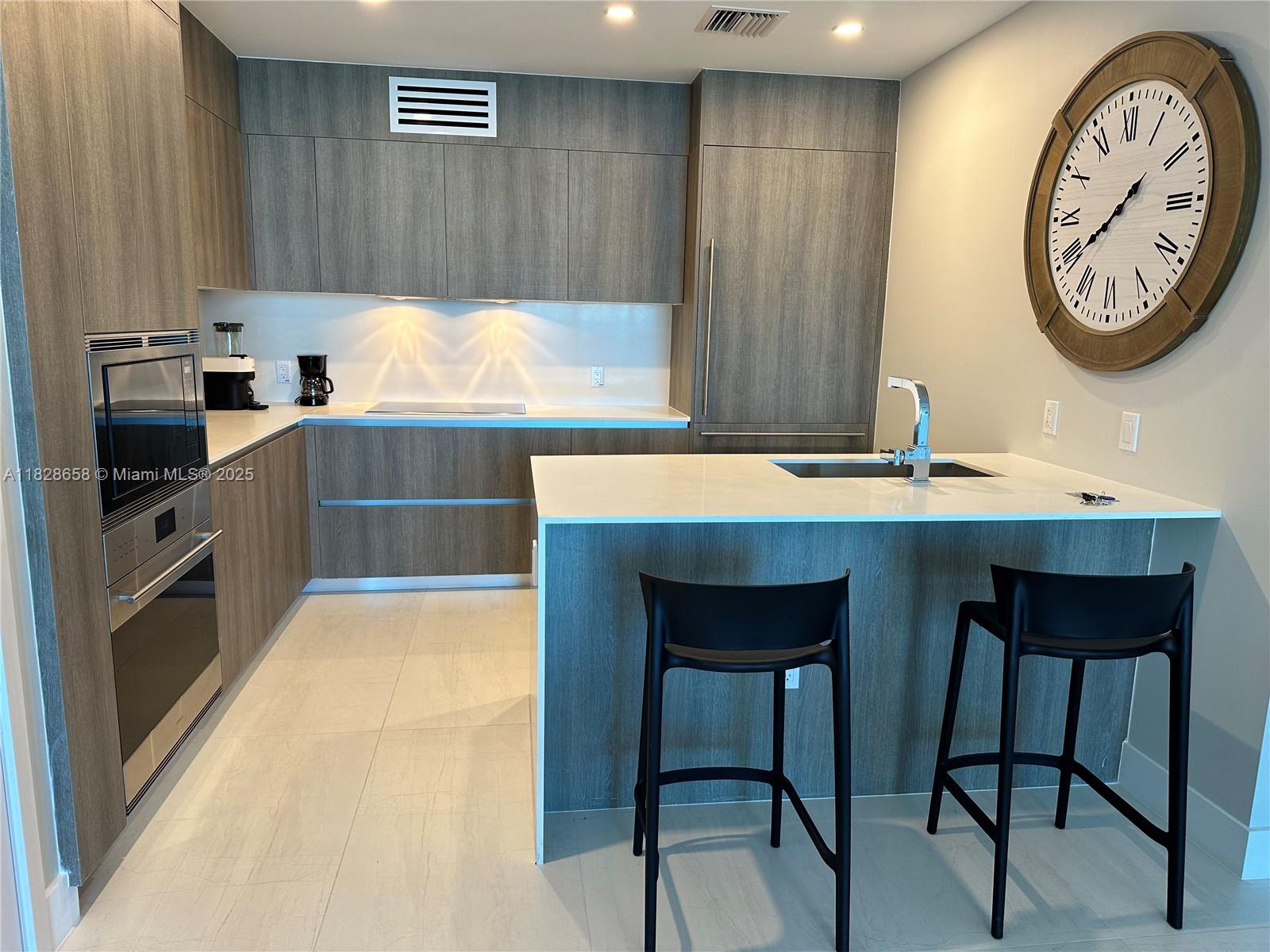 Experience luxury living in this beautifully designed 2-bedroom, 2-bathroom residence at Aurora Sunny Isles Beach, one of the area's most exclusive boutique buildings. This spacious unit features high ceilings, floor-to-ceiling windows, and a private terrace with partial ocean and city views. Aurora offers resort-style amenities :Pool Sun and deck, fitness center, yoga lounge, office room, Kids play area ,Etc. Located just steps from the beach, fine dining, shops, and top-rated schools, this apartment is ideal as a primary residence, vacation home, or investment property. Easy to show.