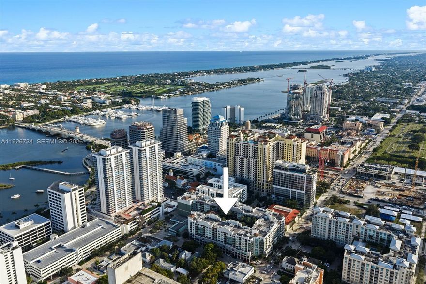 Stunning, completely remodeled 2BR/2BA residence in one of the most desirable high-rise buildings in Downtown West Palm Beach - THE PRADO -. This beautifully updated condo features brand-new vinyl plank flooring throughout, elegant crown molding, upgraded baseboards, and a spacious open-concept layout. The island kitchen is appointed with granite countertops and high-end appliances. Both bathrooms have been fully renovated with new vanities, modern lighting, mirrors, and glass tub doors. Additional upgrades include new smoke and carbon-monoxide detectors.

The split-bedroom floor plan offers enhanced privacy and generous walk-in closets. This unit includes a deeded, assigned parking space (#213) with convenient access from the second floor. 

24-hour attended lobby with state of the art amenities (located on the 5th floor) include:, courtyard-style swimming pool, hot tub, fitness center, and resident social room. Pet-friendly building with rental opportunities, making it ideal for both end-users and investors.
Enjoy exceptional urban living—just two blocks from The Square (CityPlace) and a short bike ride to Clematis Street and the beach.