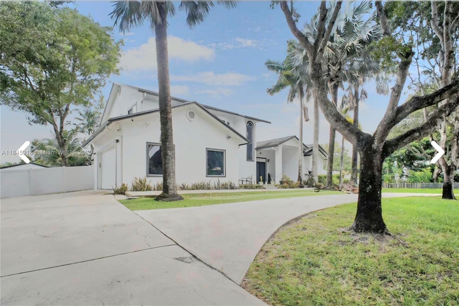 This Completely renovated Luxurious home features 5 bedrooms and 4 bathrooms & sits on nearly 3 acres of land. All outfitted with impact-resistant glass and doors.The impressive living space includes a unique built-in aquarium, while the kitchen showcases custom cabinetry and sleek quartz countertops. The massive primary suite offers two custom walk-in closets and a luxurious en-suite bathroom with dual vanities.Step outside to your private oasis, complete with a pool, basketball court, and personal gym. Best of all—no HOA!