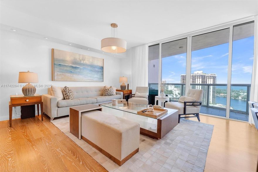 The Parc at Turnberry best corner unit for sale. Located on 20th floor, amazingly renovated & professionally decorated. Used as 2nd home, immaculate maintained. 3 beds, 3 full baths over 1820 sqft w/ wood paneling, real wood floors throughout, marble in the bathrooms, private foyer. Large open balcony facing east w/ intracoastal & ocean views. Every room has its own balcony w/ intracoastal, ocean/city views. Italian cabinetry w/ double oven, SS appliance, SS back splash & quartz countertop. Barn door off kitchen/living.  Lots of custom closets, cabinetry Unit is sold as is furnished, decorated w/ furniture, electronics /decorated effects. Custom window treatment. Special lightening. Building offers valet, security SPA, jacuzzi, pool, billiard room etc..Walk distance to synagogue Pets ok!