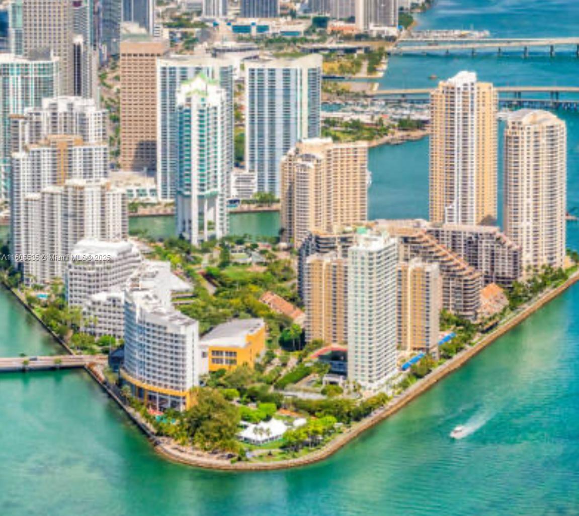 Elegant condo renovated in Brickell Key Island with breathtaking unobstructed ocean and city views. Offers a modern living experience 3 bedrooms, 2 full baths, 1 half bath, big balcony, in an open concept living space, gourmet kitchen, granite countertops, impact windows, in-unit laundry, 24 hour security and concierge services. Unit comes with 3 parking spaces. Building offers two-story gym, waterfront pool, great amenities. Situated in a desirable location with access to local dining, shopping, entertainment, finantial district of Miami, beaches & airport.