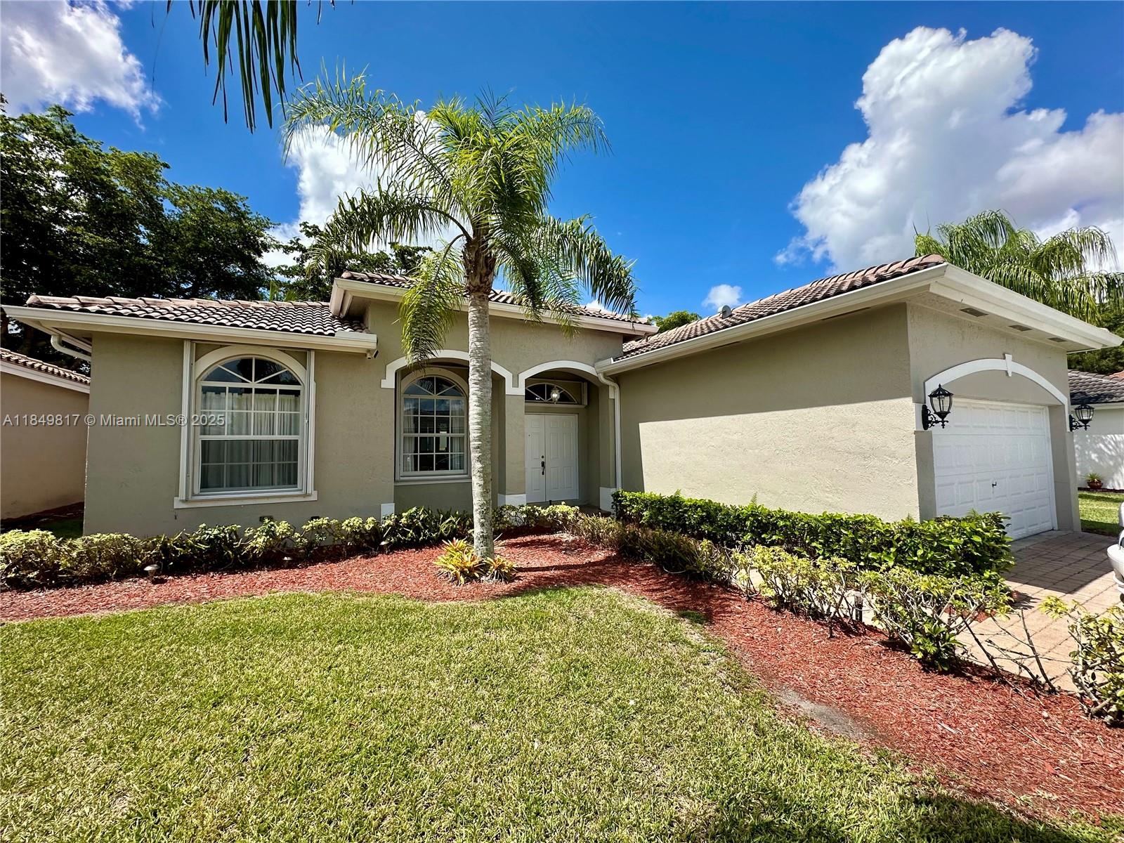 Welcome to this beautifully maintained 3-bedroom, 2-bathroom home featuring tile floors throughout the main living areas and warm wood floors in the bedrooms. The updated kitchen is equipped with brand-new stainless steel appliances.
Step outside to a large, private patio with a covered terrace—ideal for relaxing or hosting guests. Unwind in the swing chair and enjoy the peaceful outdoor space. The home also offers a convenient 2-car garage, providing plenty of storage and parking.