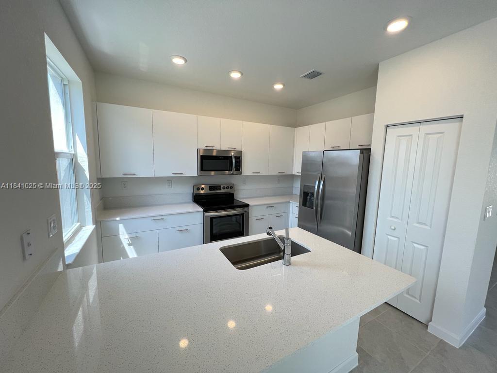 12958 NW 23rd Pl