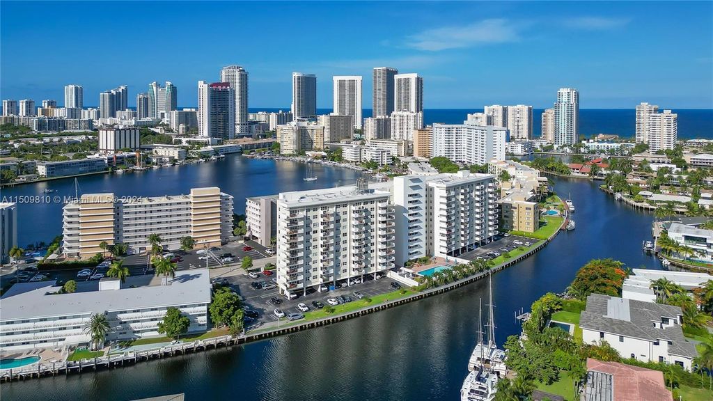 Photo of 401 Golden Isles Dr #409, Hallandale Beach, FL 33009 (MLS # A11509810)