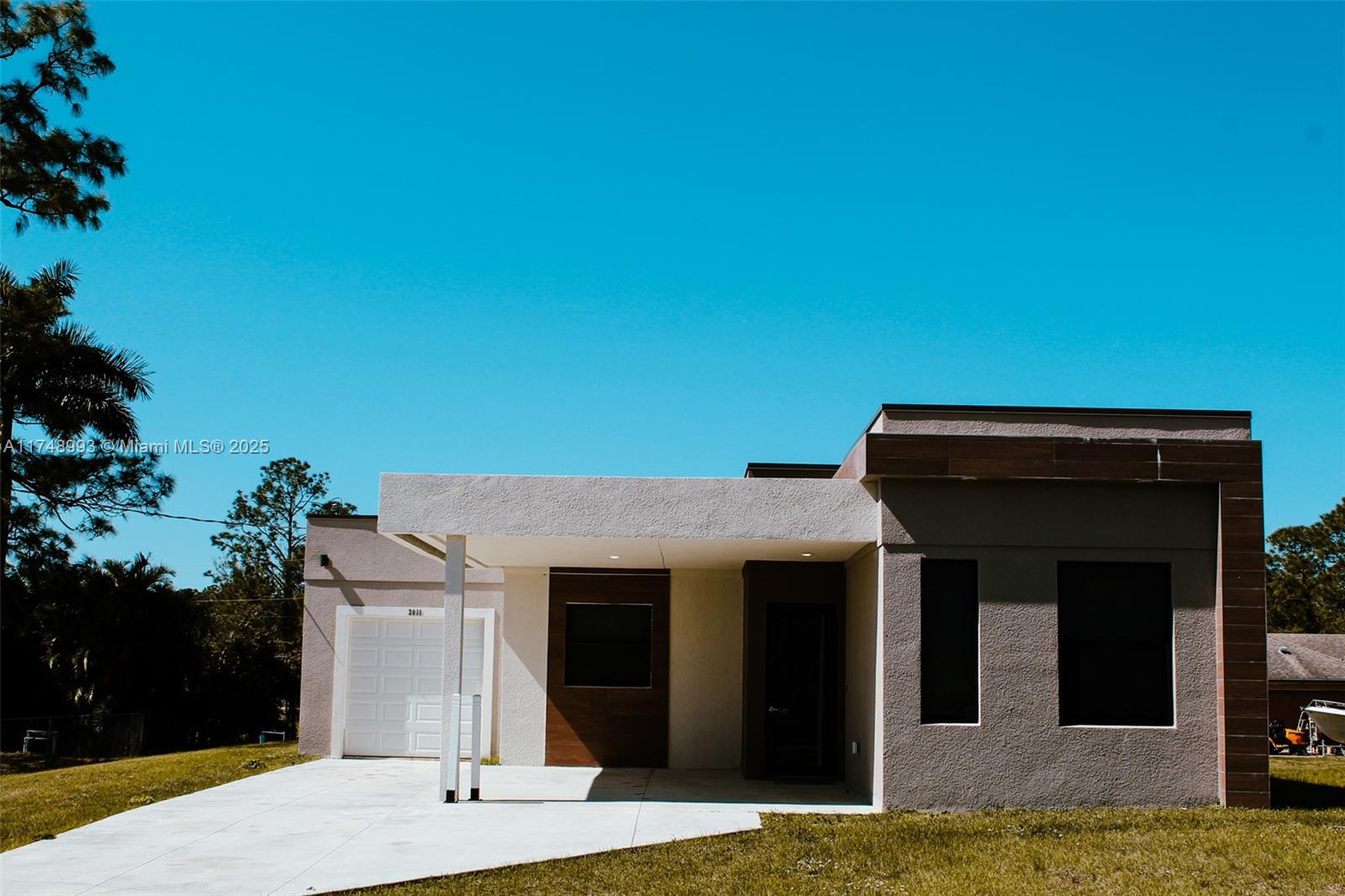 Property for Sale at 2011 Olsen Lane, Lehigh Acres, Lee County, Florida - Bedrooms: 3 
Bathrooms: 2  - $349,999