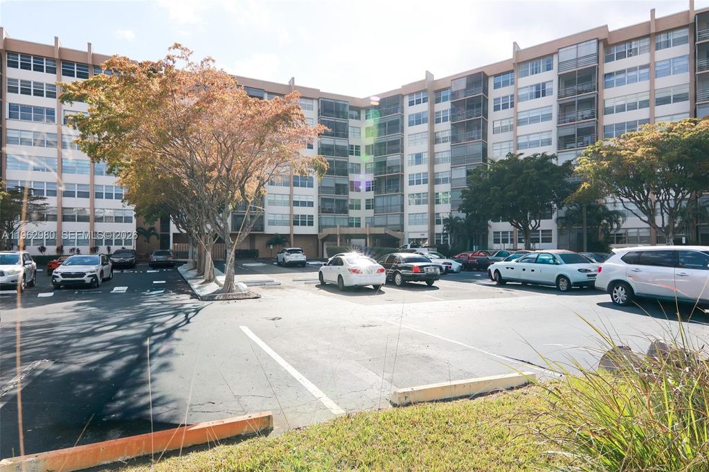 Photo of 1200 Saint Charles Pl #302, Pembroke Pines, FL 33026 (MLS # A11962980)