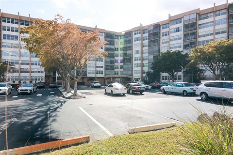 Photo of 1200 Saint Charles Pl #302, Pembroke Pines, FL 33026 (MLS # A11962980)