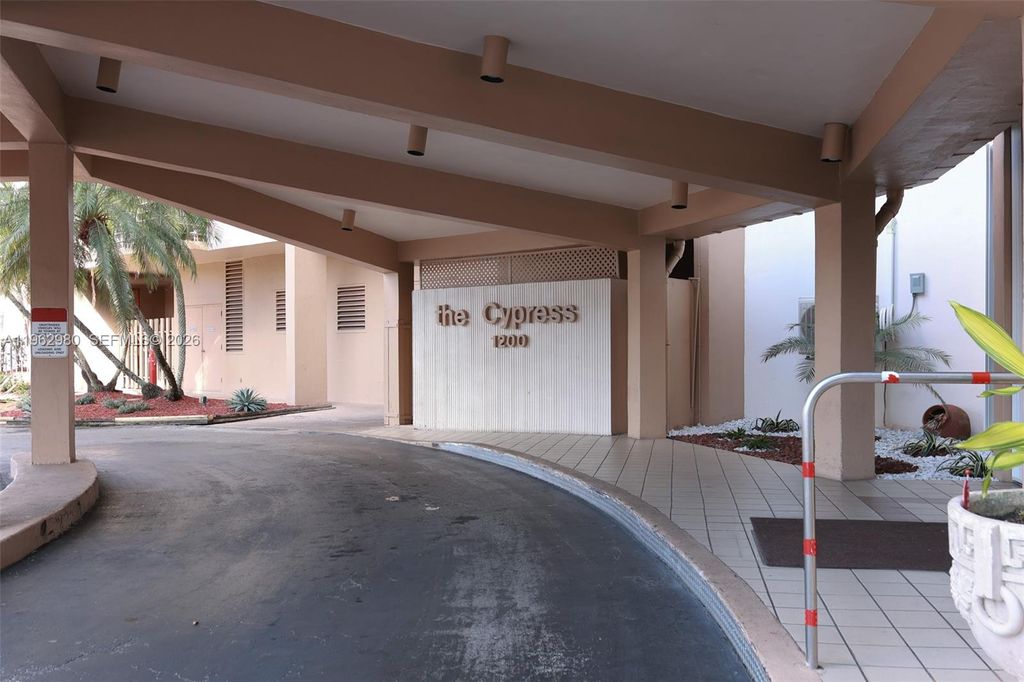 Photo of 1200 Saint Charles Pl #302, Pembroke Pines, FL 33026 (MLS # A11962980)