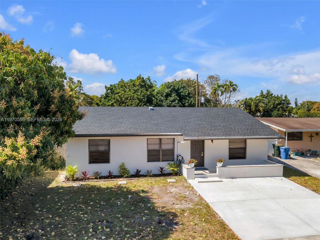 Photo of 4141 NW 16th Ave, Oakland Park, FL 33309 (MLS # A11970556)