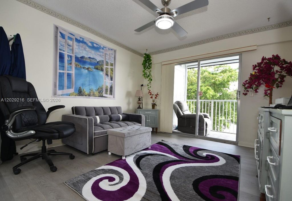 Photo of 1401 SW 134th Way #402C, Pembroke Pines, FL 33027 (MLS # A12029216)