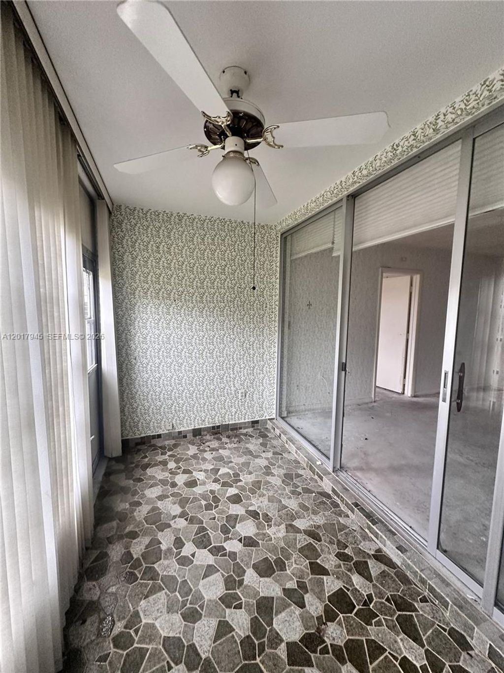 Photo of 6001 NW 61st Ave #111, Tamarac, FL 33319 (MLS # A12017945)