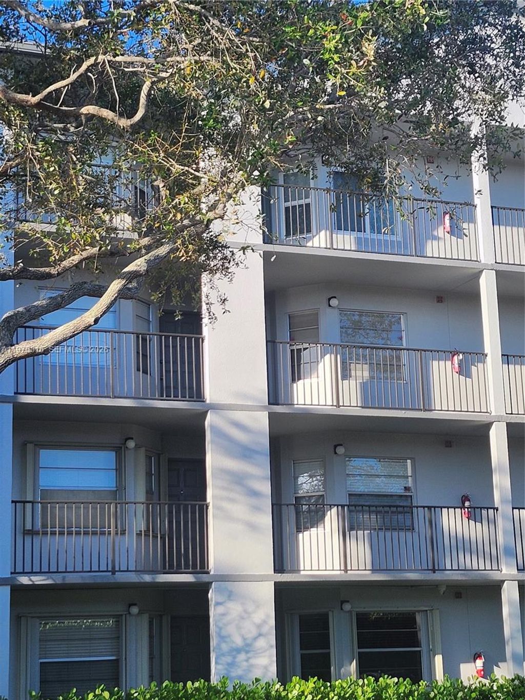 Photo of 12501 SW 14th St #311R, Pembroke Pines, FL 33027 (MLS # A11970816)