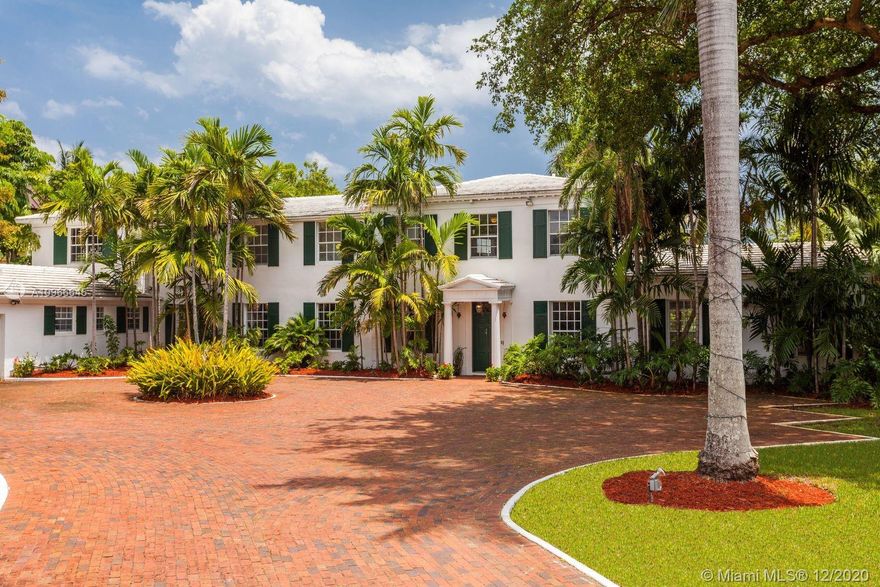 Stunning, Classic Georgian Estate on Miami Beach's waterfront, sitting on 2 lots making up 3/4 of an acre. This gated five-bedroom, six-bathroom home is located in prestigious Lakeview neighborhood. Features over 6,000 SF of elegant living space including grand living room w/high ceilings & full bar room, large gourmet kitchen w/island and butler's pantry, breakfast room, one of a kind library/billiard room, formal dining room overlooking the large pool, four bedrooms upstairs including the master suite.