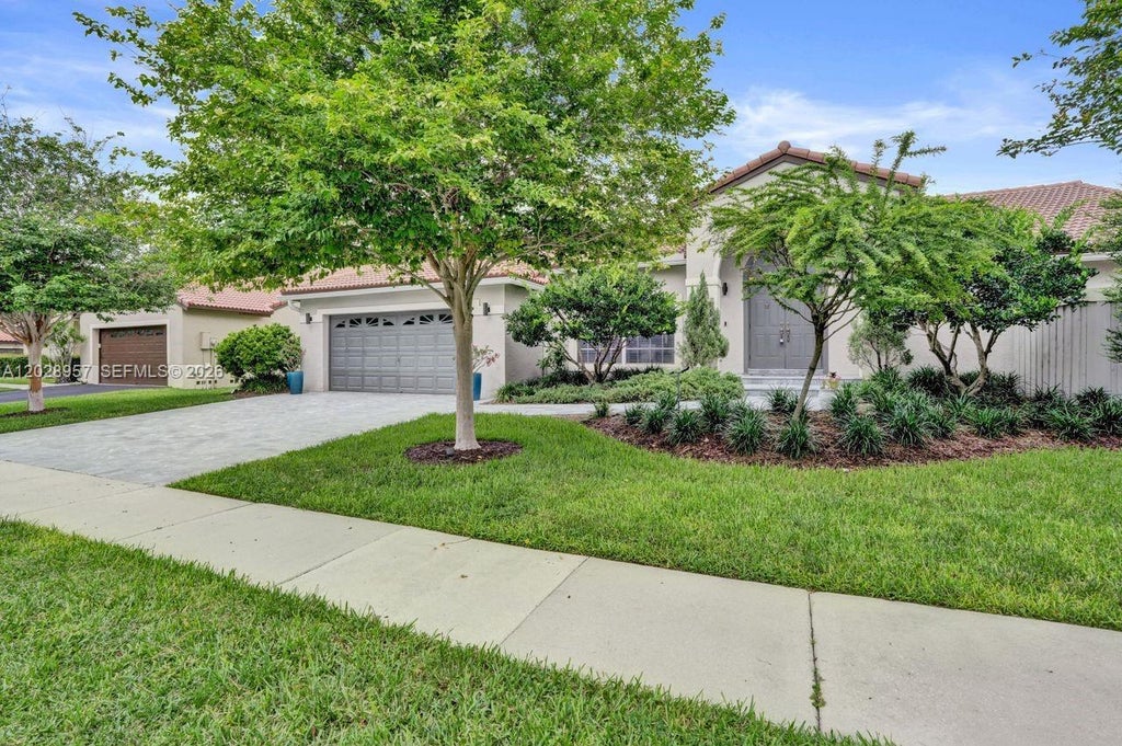 Photo of 13331 NW 11th Ln, Sunrise, FL 33323 (MLS # A12028957)