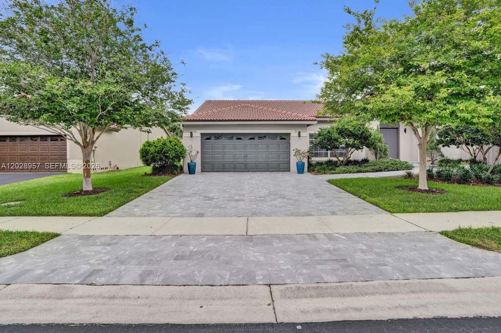 Photo of 13331 NW 11th Ln, Sunrise, FL 33323 (MLS # A12028957)