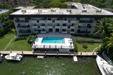 Photo of 6815 Edgewater Dr #301, Coral Gables, FL 33133 (MLS # A12068140)
