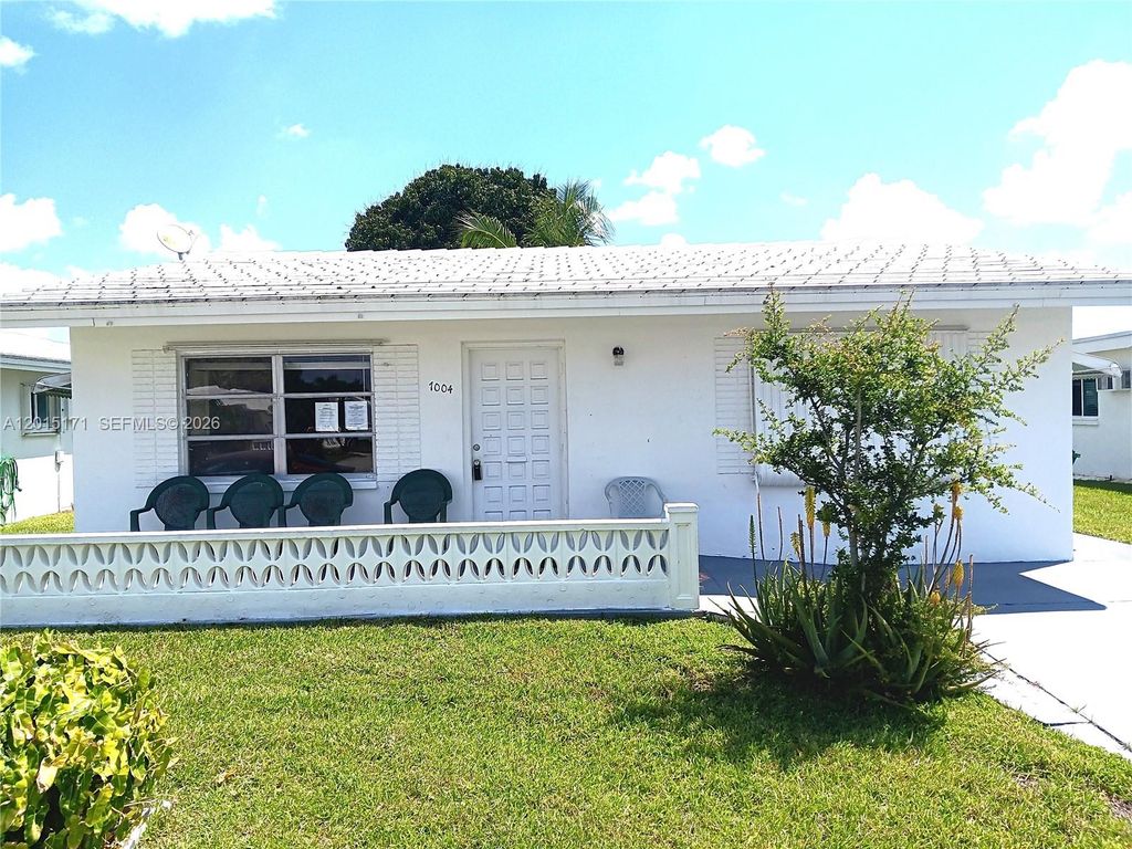 Photo of 7004 NW 67th Ave, Tamarac, FL 33321 (MLS # A12015171)
