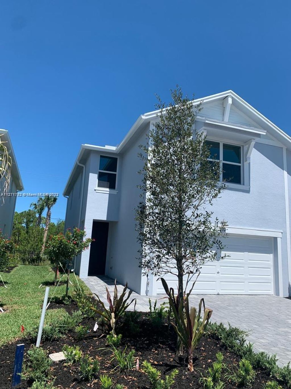 Photo of 210 Osprey Preserve Blvd #210, Jensen Beach, FL 34957 (MLS # A11271782)