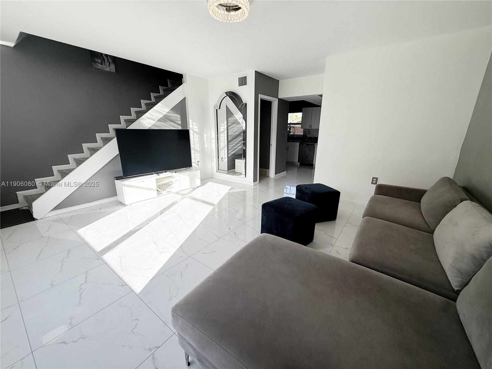 TAM OSHANTER GARDENS FAMI - Residential Lease