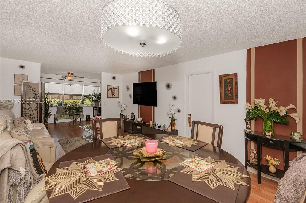 Photo of 9881 NW Sunrise Lakes Blvd #106, Sunrise, FL 33322 (MLS # A11946028)