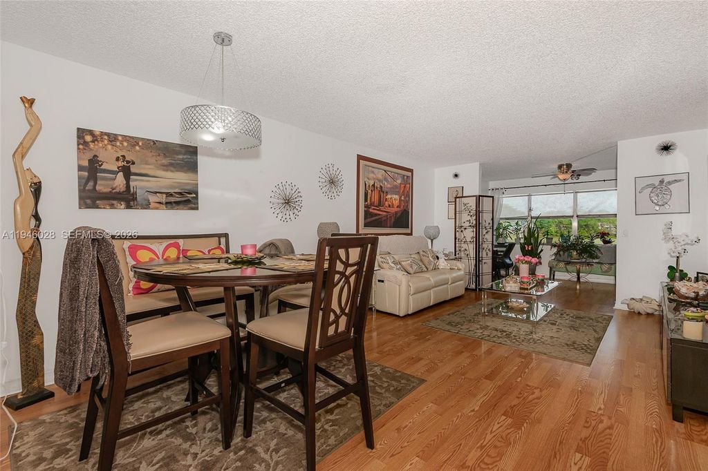 Photo of 9881 NW Sunrise Lakes Blvd #106, Sunrise, FL 33322 (MLS # A11946028)