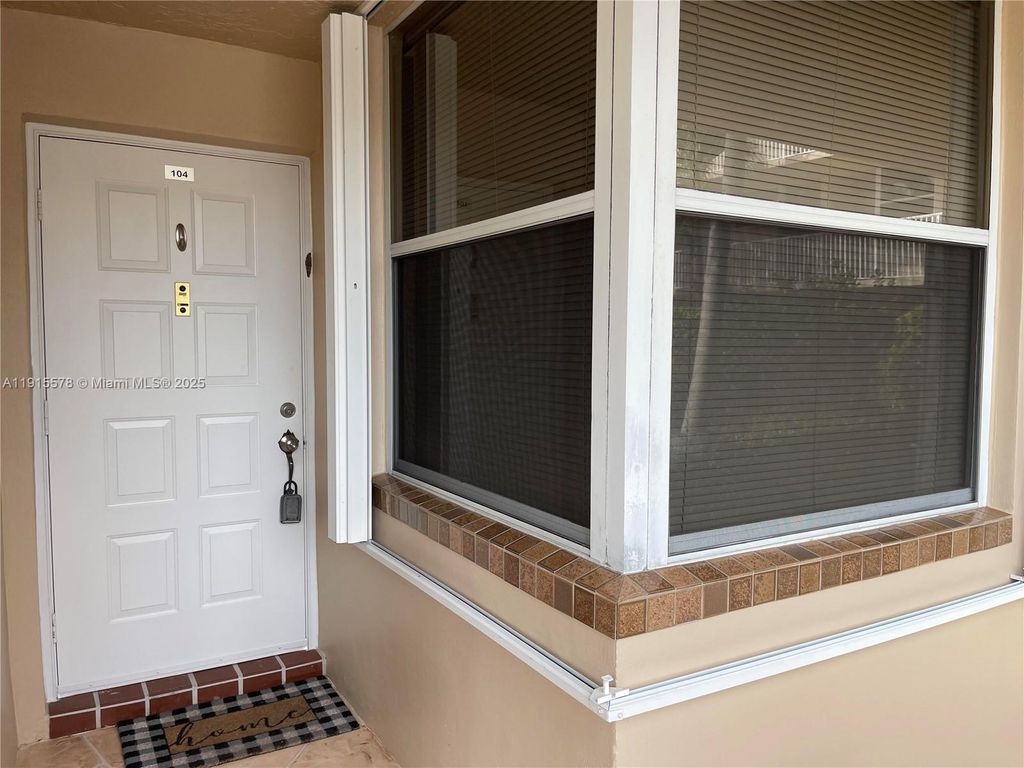 Photo of 10369 NW 24th Pl #104, Sunrise, FL 33322 (MLS # A11915578)