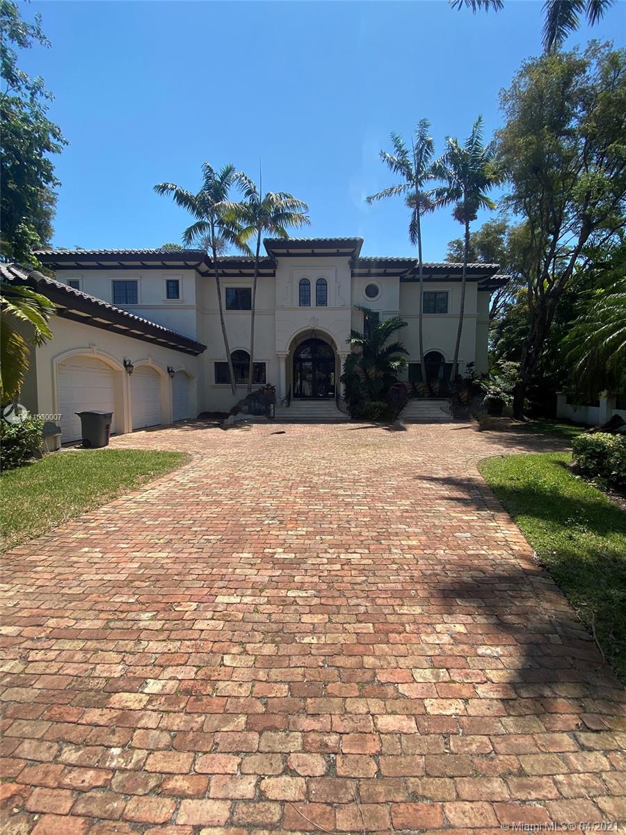 A two-story 7,113 Sq. Ft. beautiful villa in the exclusive gated community of Cocoplum with a Mediterranean revival style that includes Spanish elements. This 5 bedroom, 5.5 baths home also has a gated and hedged entrance that opens into the private formal gardens. Combining elegant finishes and spacious entertaining areas, this estate is perfect for today’s lifestyle.