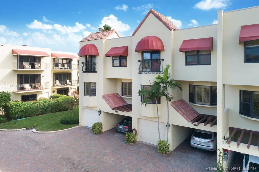 Incredible multi-level townhome with private elevator located in the heart of Juno Beach nestled between the Atlantic Ocean and Pelican Lake.  A gated seacoast community of only 39 residents.  This end unit has 4 BR 3.5 BTH.  2680 square feet plus 3 balconies and oversized patio with cozy lounging spaces and a shady grilling area.  One car garage plus attached and adjacent car port.  Steps to the tropical resort style pool with spa and fitness.  There is also a private community boardwalk to the Ocean.  Other highlights: newly renovated kitchen and baths, new screens for entire home, plantation shutters throughout and lots of storage. Move in today and enjoy listening to the ebbing of waves on the Cote De La Mer shore.