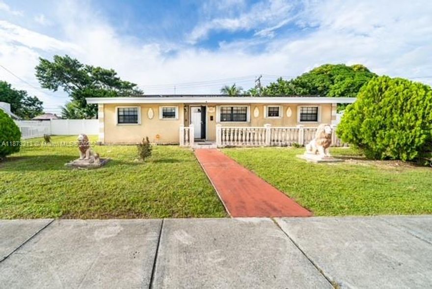 Discover this spacious home on an oversized lot just steps from the world-famous Hard Rock Stadium. The main house operates as a 4-bedroom 3 bathroom residence and the property also includes a detached 1 bedroom and 1 bathroom studio with a tenant in place providing additional income potential. Recent updates include a new roof completed with permits and solar panels that will be fully paid off at closing offering long-term value and energy efficiency. The oversized lot provides plenty of room for expansion outdoor entertaining or the addition for a pool. Perfect for both first-time buyers and investors. This property offers strong potential with just a little TLC. Conveniently located near shopping, dining, major highways and entertainment.