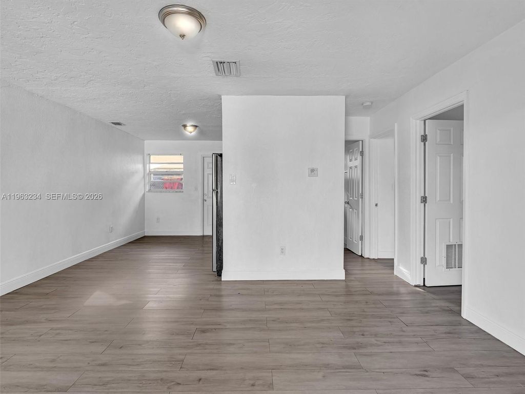 Photo of 2512 NW 9th Pl, Fort Lauderdale, FL 33311 (MLS # A11963234)