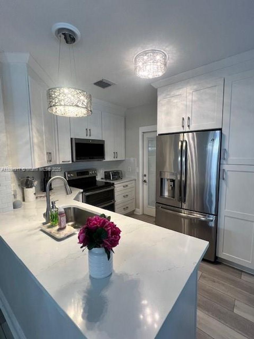 Beautiful 3 bedroom 2.5 bath town home in Tamarac FL. Home features luxury vinyl floors, porcelain tiles, stainless steel appliances.