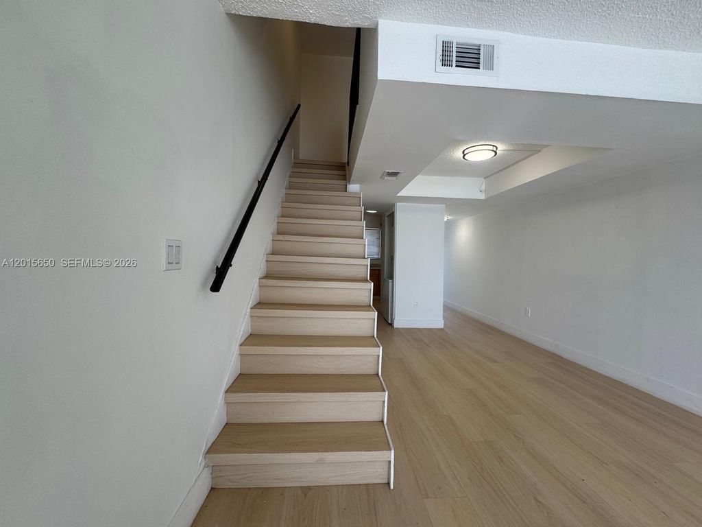 Photo of 4122 SW 61st Ave #8, Davie, FL 33314 (MLS # A12015650)