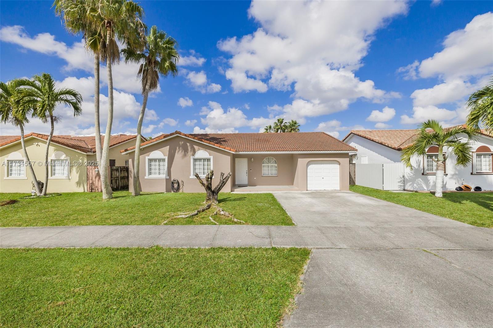 Your dream home is here! Spacious 3-bedroom, 2-bathroom home with a 1-car garage, washer and dryer, and tile floors throughout. Large backyard with room for a pool. Conveniently located near shopping centers, Miami Zoo, and just minutes from Krome Ave and Florida Turnpike. This home has great potential and is an excellent option for first-time buyers!