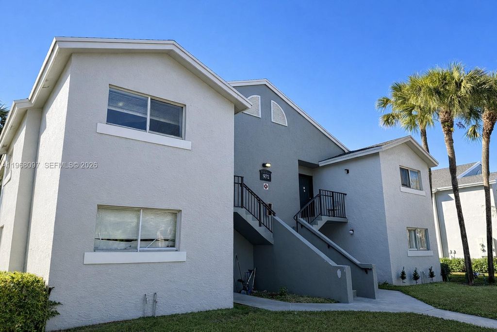 Photo of 971 Lake Terry Dr #C, West Palm Beach, FL 33411 (MLS # A11968097)