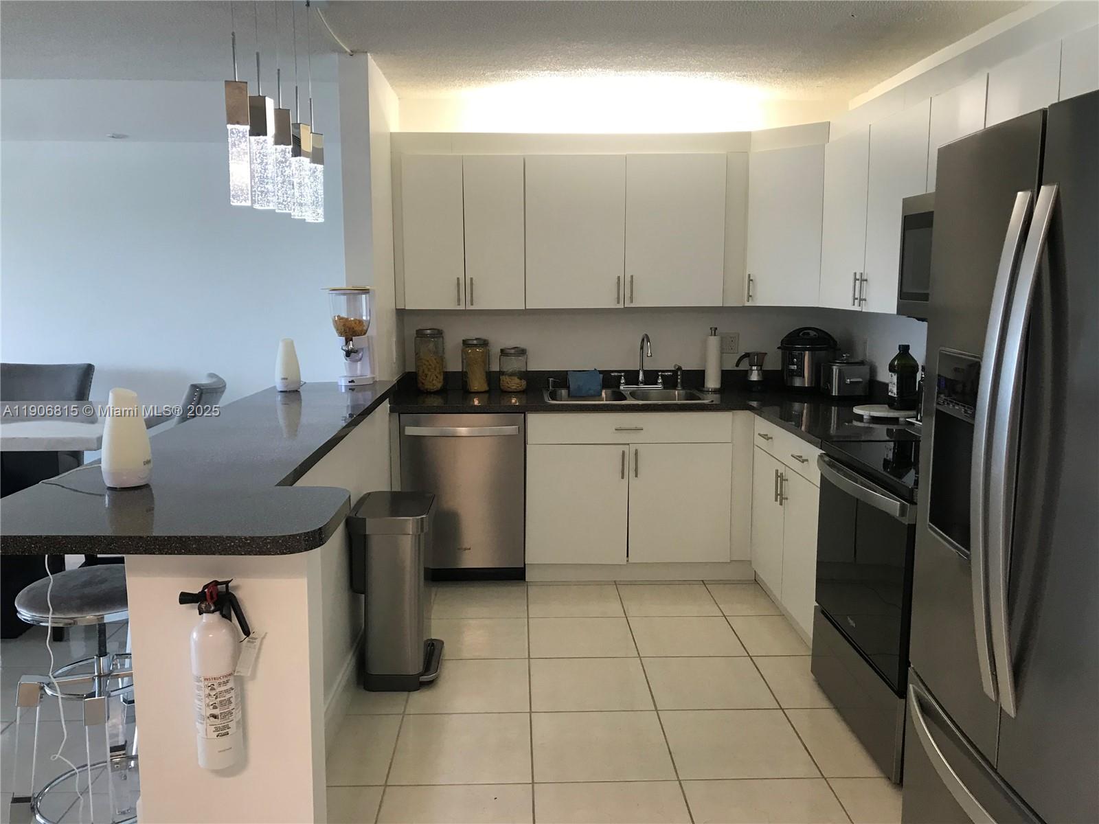 NARANJA LAKES CONDO NO 5 - Residential Lease