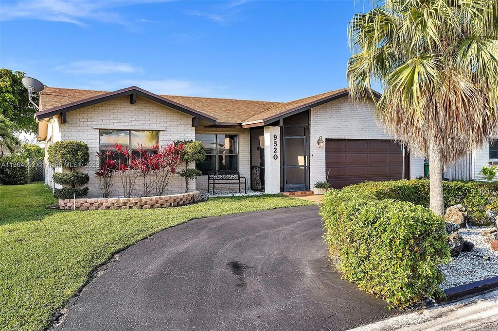 Photo of 9520 NW 82nd St, Tamarac, FL 33321 (MLS # A11364992)