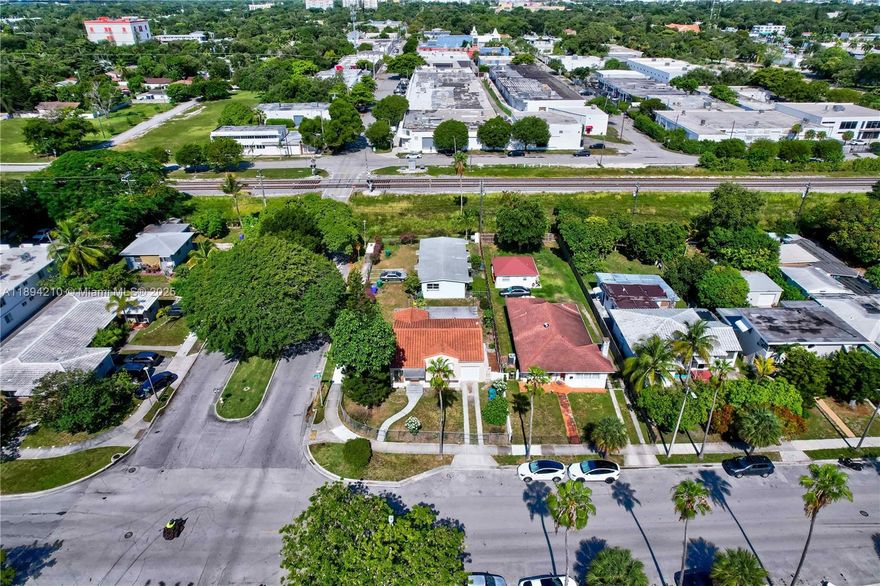 In the heart of vibrant MiMo, this charming pre-war gem offers the perfect blend of historic character. The main house has 3 bedrooms, 2 full bathrooms, a formal dining room, and restored dade pine wood floors. Roof is new, freshly painted in and out, with garbage, a second detached dwelling features two separate 1-bedroom, 1-bath units with original terrazzo flooring. Whether you're a growing family in need of extra space or a savvy investor seeking strong returns, this is a rare chance to own a versatile and income-producing property.
Located just minutes from Morningside Park, the Design District, and Buena Vista, this property sits in one of Miami’s most desirable and rapidly appreciating neighborhoods.
