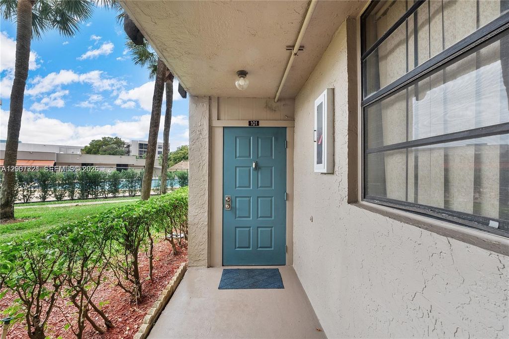 Photo of 1101 Colony Point Cir #101, Pembroke Pines, FL 33026 (MLS # A12007721)